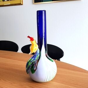 Hand blown glass vase with peacock